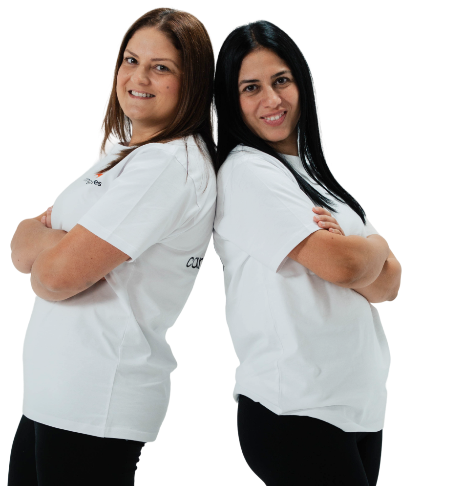 Two friendly Caring Bridges support workers