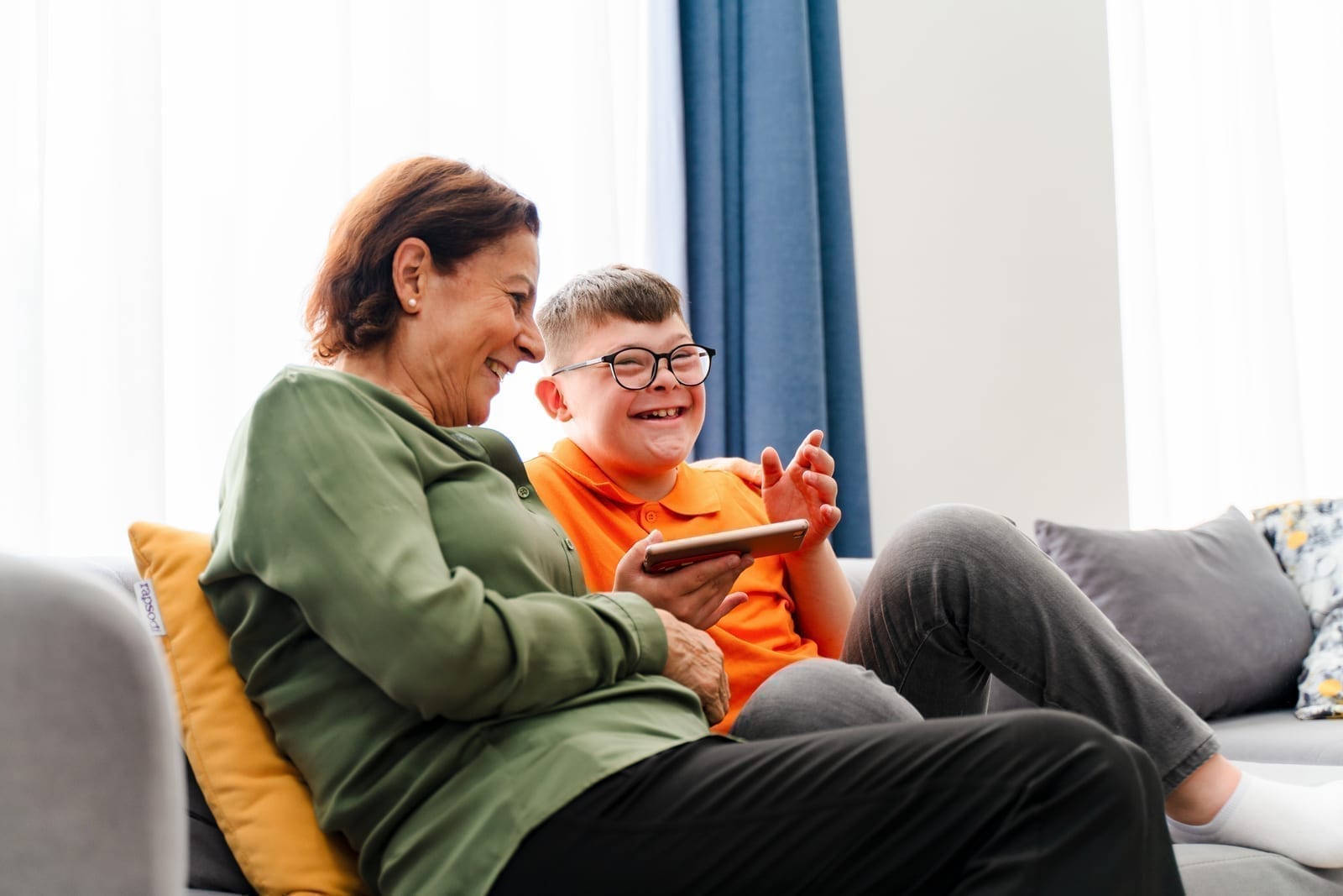 A carer and a young person enjoying time together