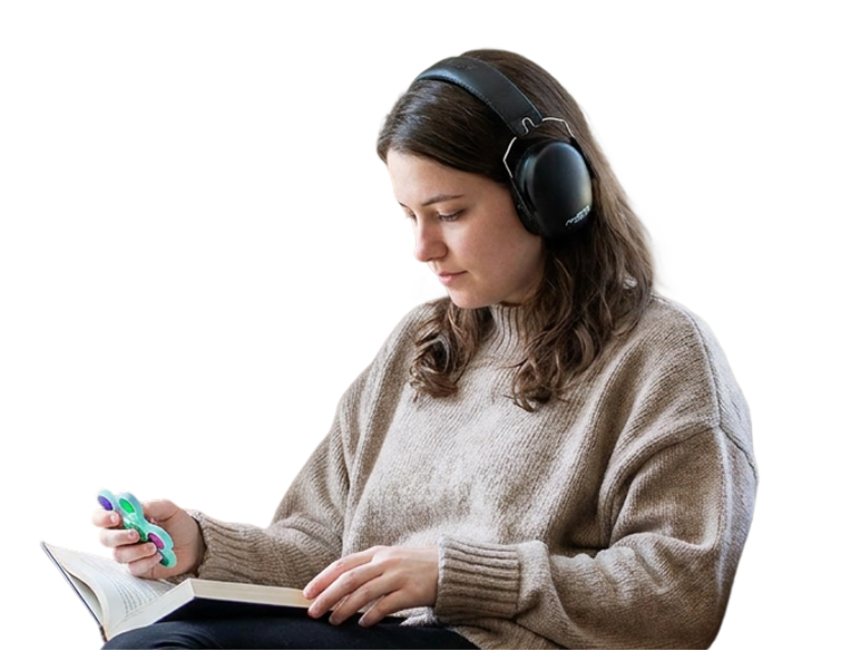 A participant relaxing with a book and headphones