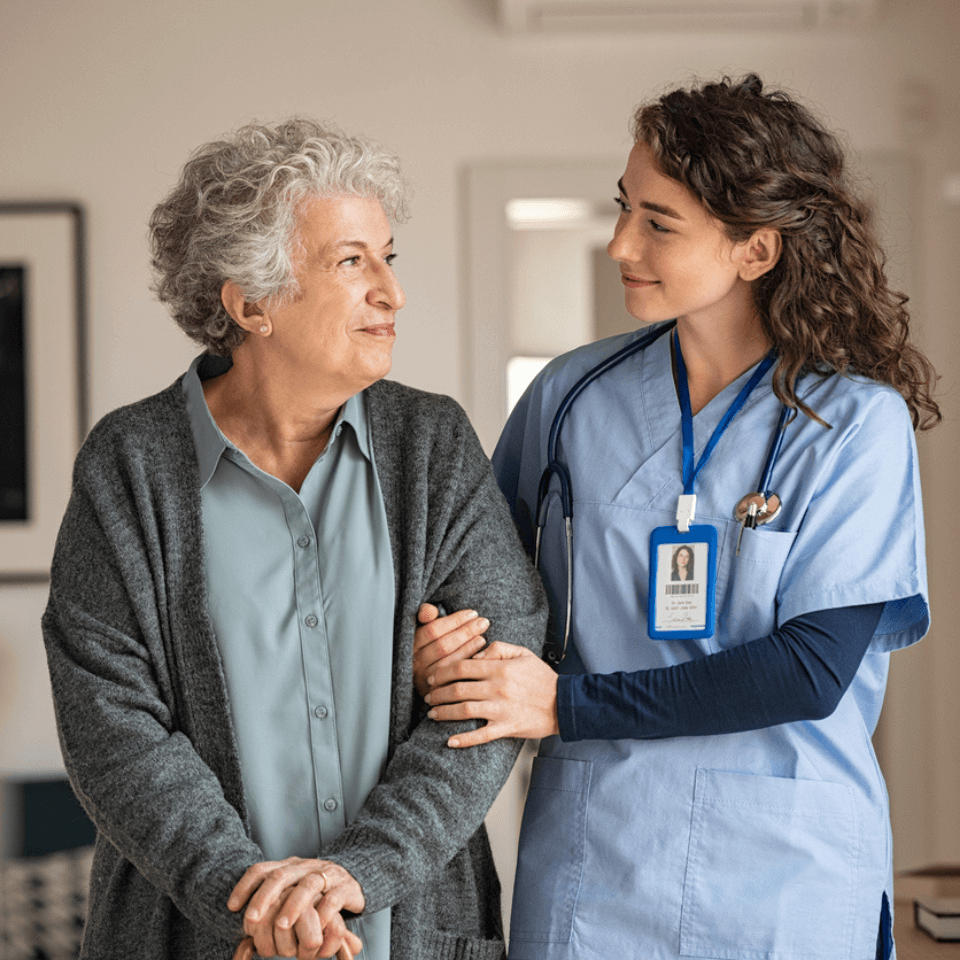 Nurse in uniform with patient