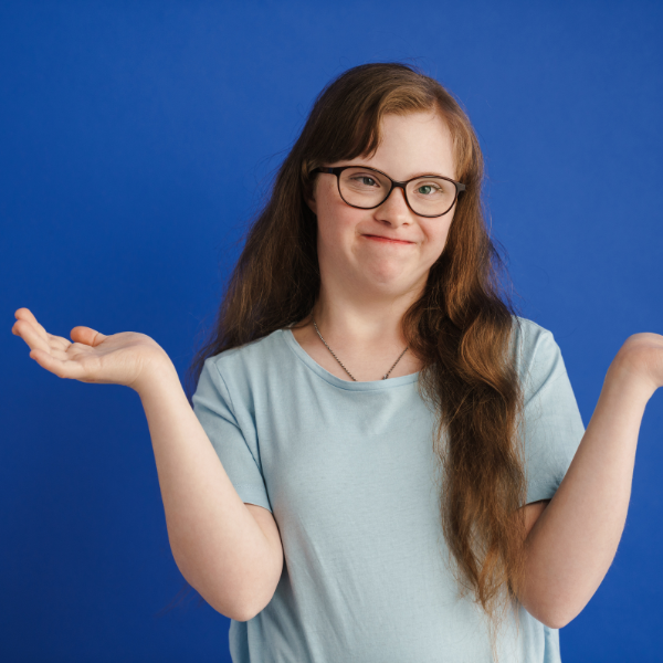 Participant standing in front of blue wall